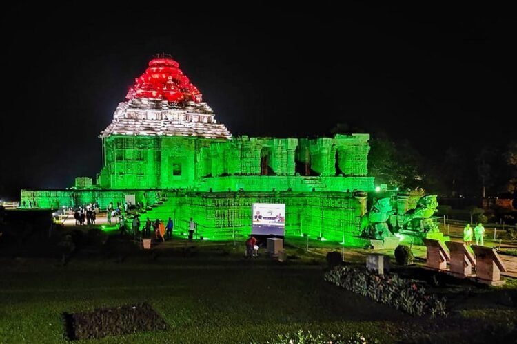Puri: Konark Sun Temple illuminated with tri-colour lights as India crossed the 1 billion COVID-19 vaccination milestone, near Puri, Thursday, Oct. 21, 2021. (PTI Photo)(PTI10_21_2021_000216B)