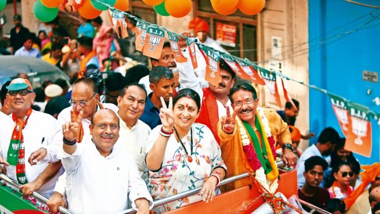 Union Minister Smriti Irani held a road show on Thursday in support of Harsh Malhotra East Delh, the BJP candidate from East Delhi,Express Photo by Gajendra Yadav,230524